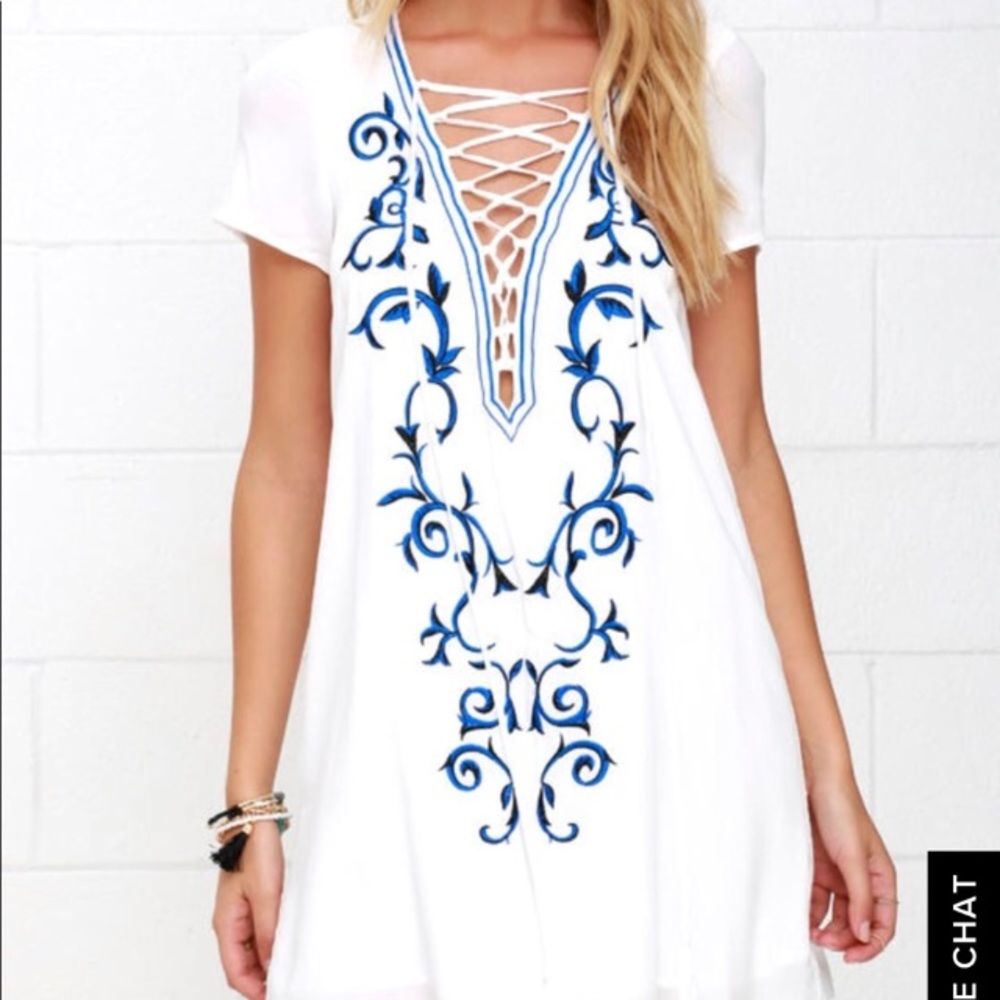 Lulu’s white shirt dress with lace up deep v